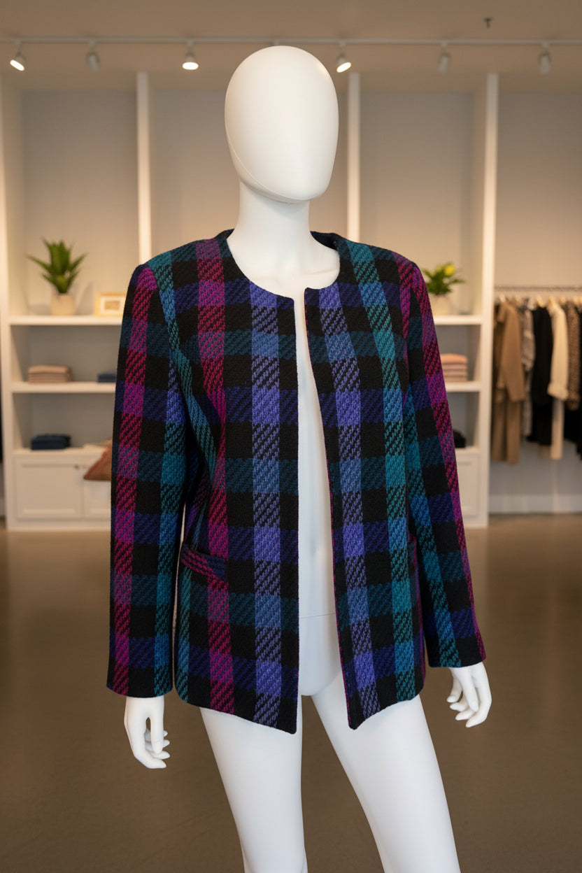 Vintage Plaid jacket on a mannequin in a room with a laptop and chair.