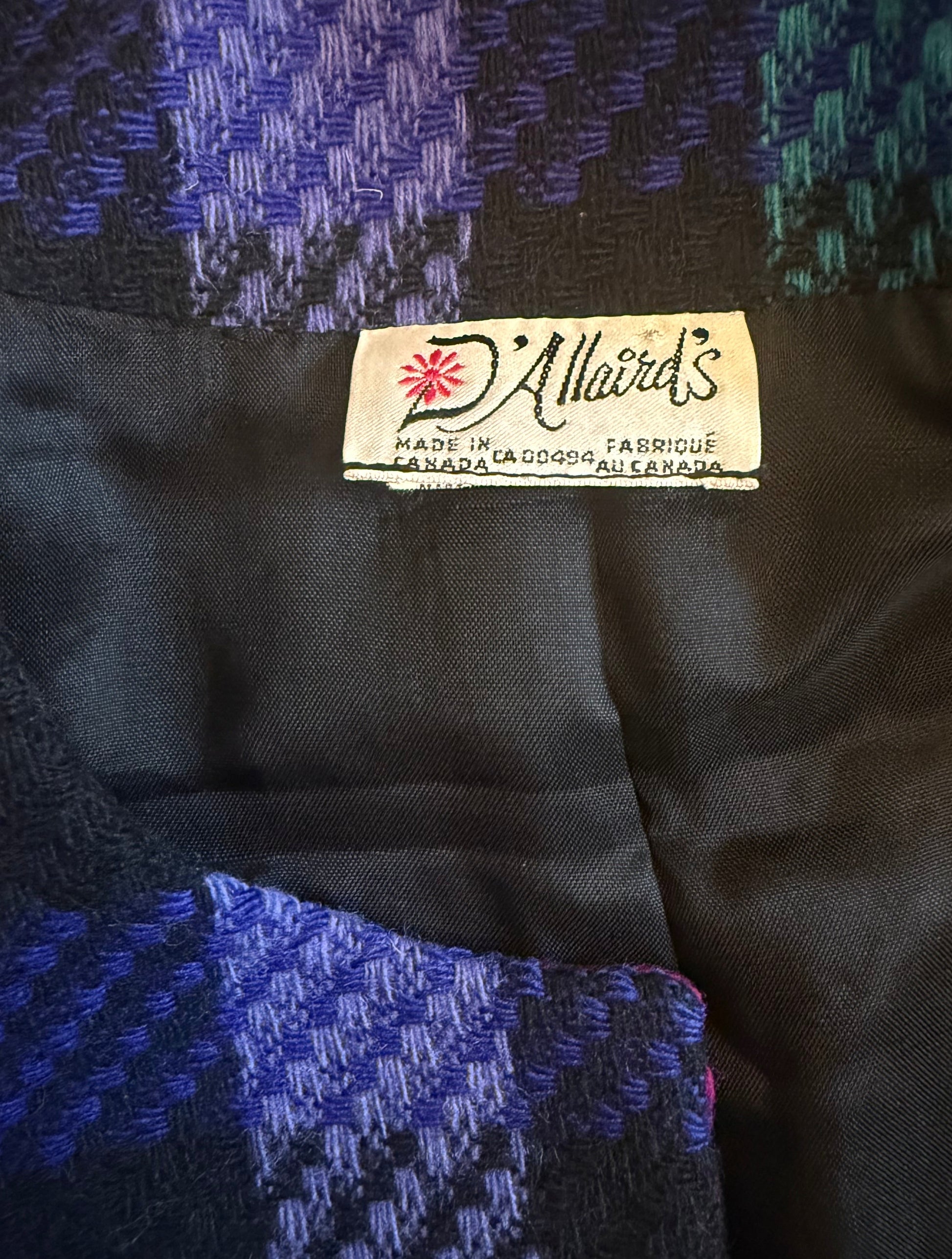 Close-up of a label on a piece of fabric with a patterned background