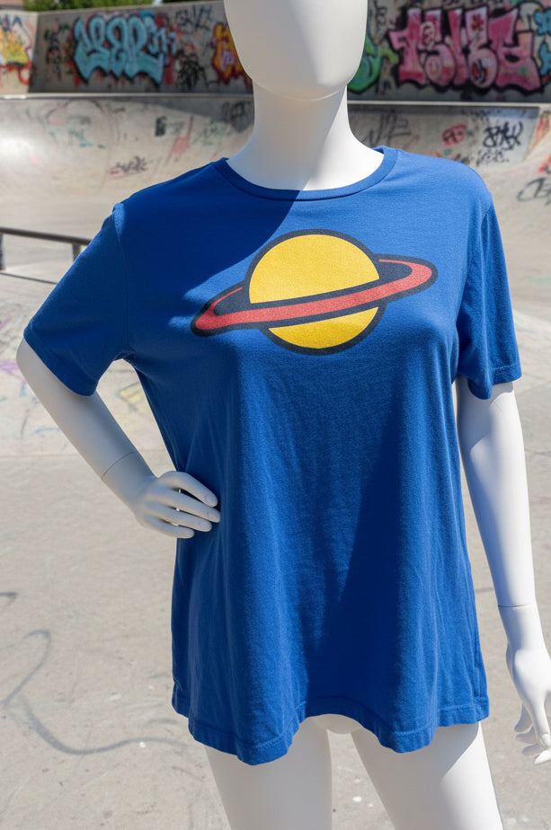 Mannequin wearing a blue t-shirt with a rugrats graphic design in a skate park